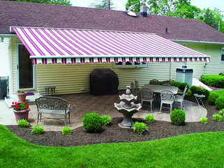 striped residential retractable awning in Raleigh